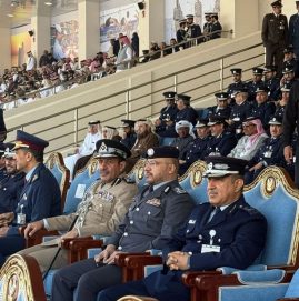 وفد من شرطة أبوظبي يزور كلية الشرطة في قطر
